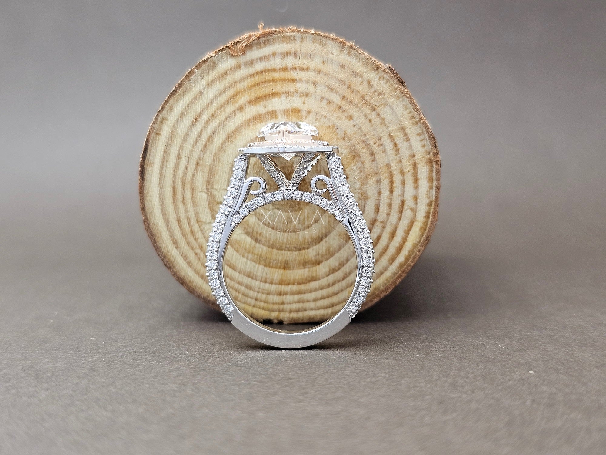 Silver ring with diamond accents on a wooden surface - Xavia Jewels
