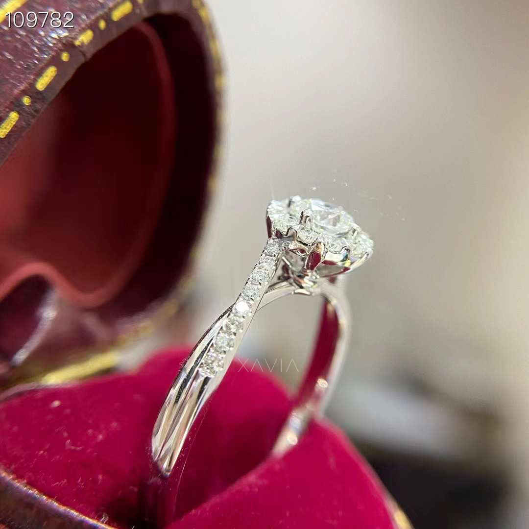 side profile of round cut lab diamond halo ring displaying elevated setting and pavé diamond band craftsmanship