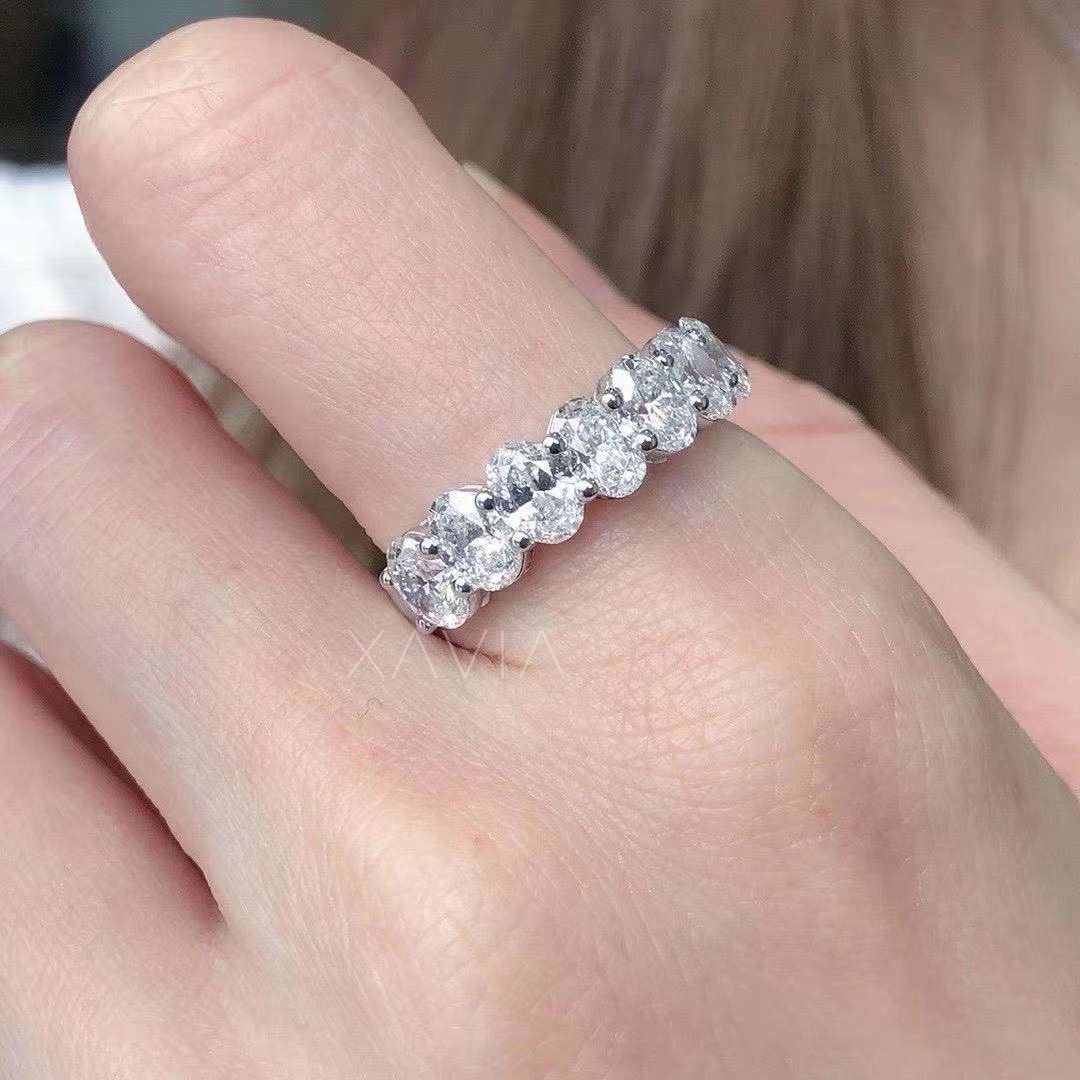 Close-up of Oval-Cut Lab-Grown Diamond Band with Shared Prong Setting