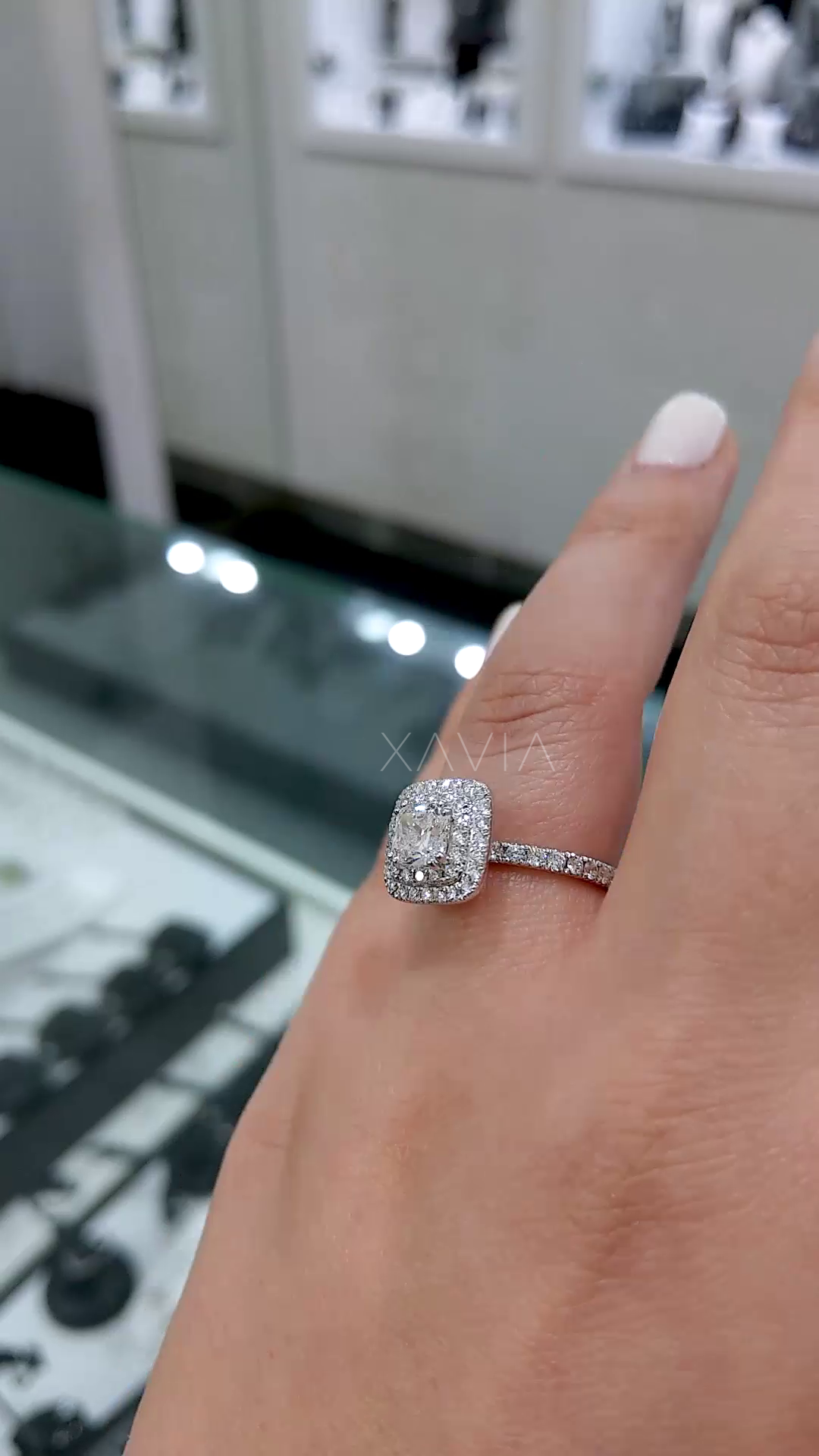 angled perspective of cushion cut lab diamond ring with micro pavé halo and split shank band highlighting sparkle and structure