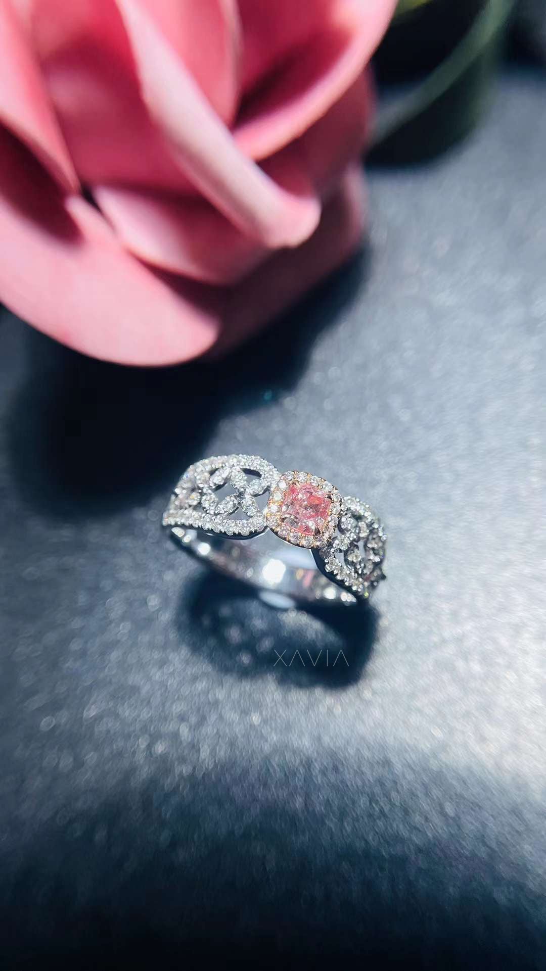 angled side profile of Aurivine pink cushion cut diamond engagement band with floral pavé halo design in white gold