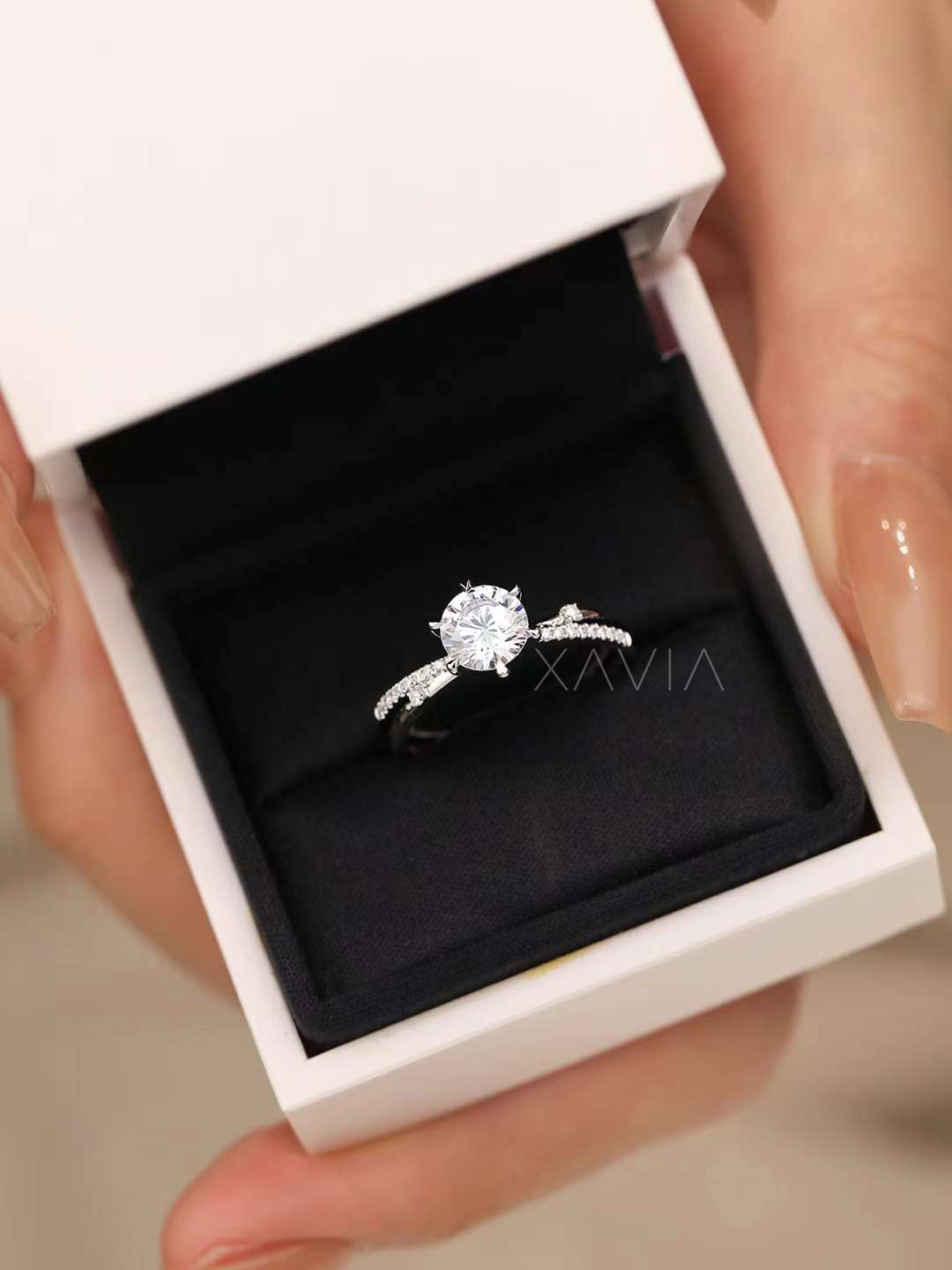round brilliant solitaire lab diamond engagement ring with pavé band presented in luxury black velvet ring box