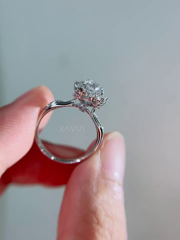Profile view of pavé cathedral diamond engagement ring highlighting elegant band curvature and elevated halo diamond head