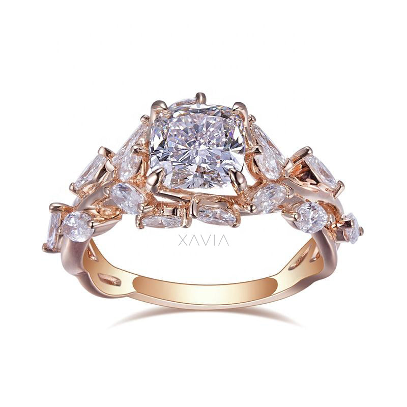 front view of cushion cut lab grown diamond engagement ring featuring marquise oval and baguette side diamonds arranged in floral cluster halo design