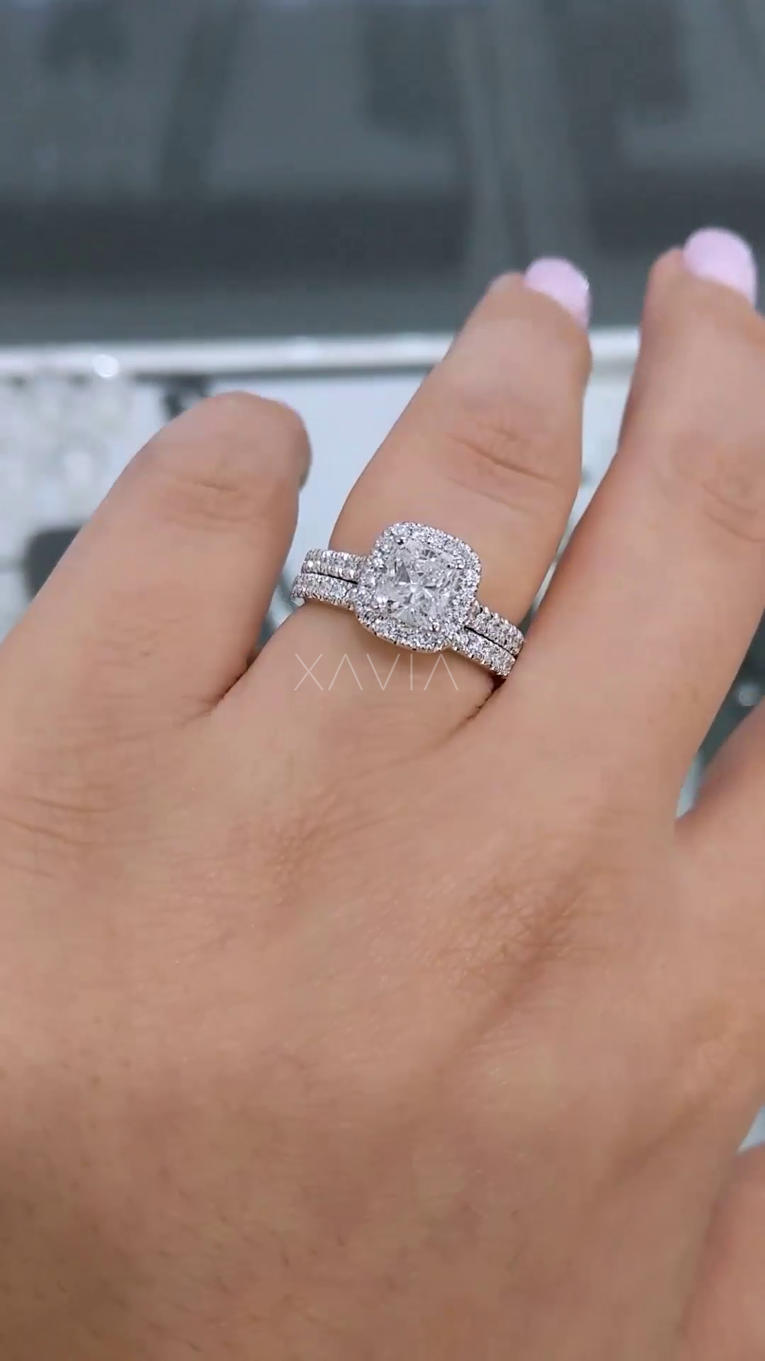 cushion cut lab diamond engagement ring paired with matching pavé wedding band creating a stacked bridal set look with continuous sparkle