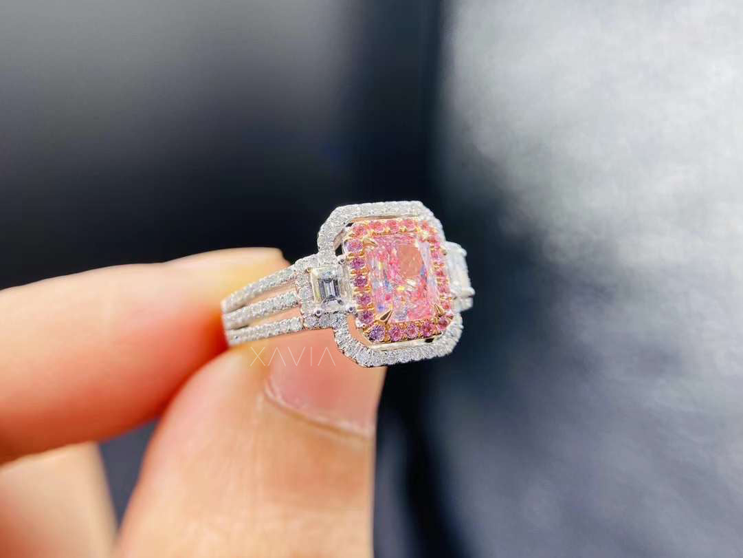 side view of radiant pink cushion cut lab diamond ring with split shank and baguette diamonds