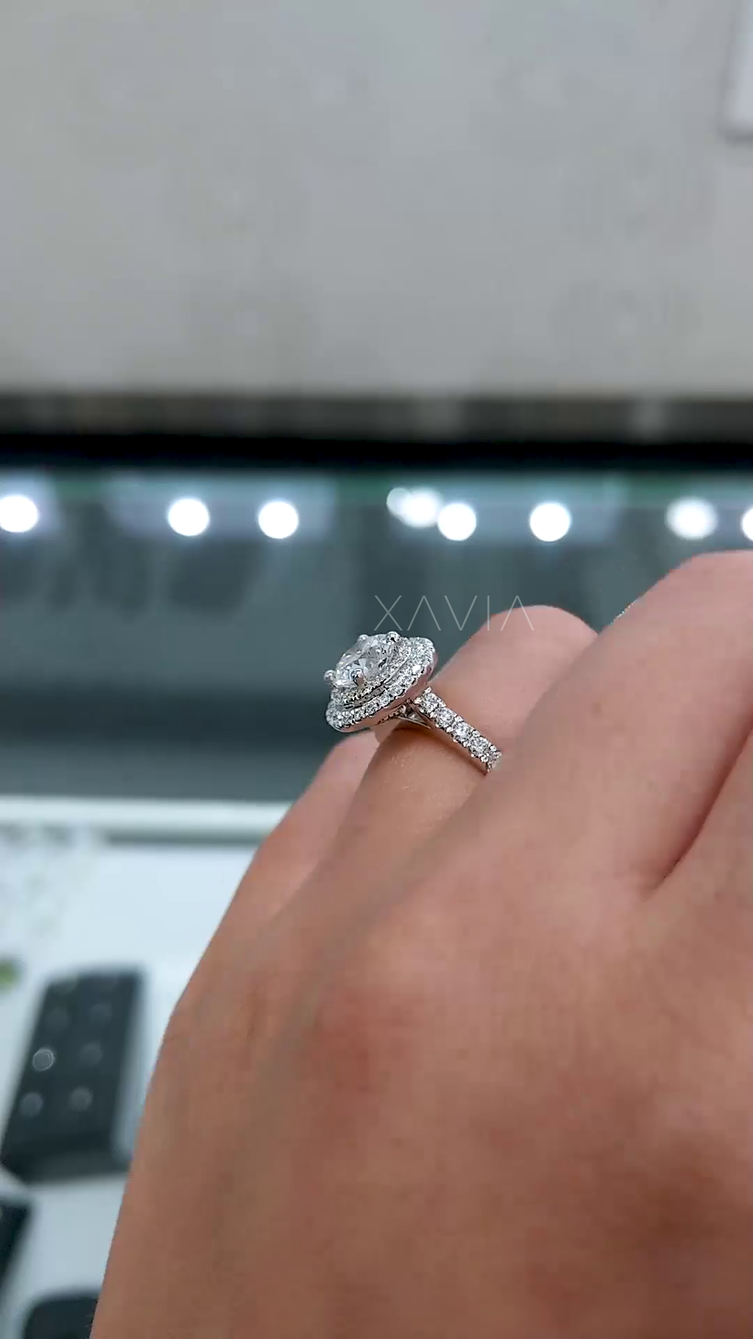 detailed side angle of double halo lab diamond ring showing basket structure pavé band and elevated setting craftsmanship