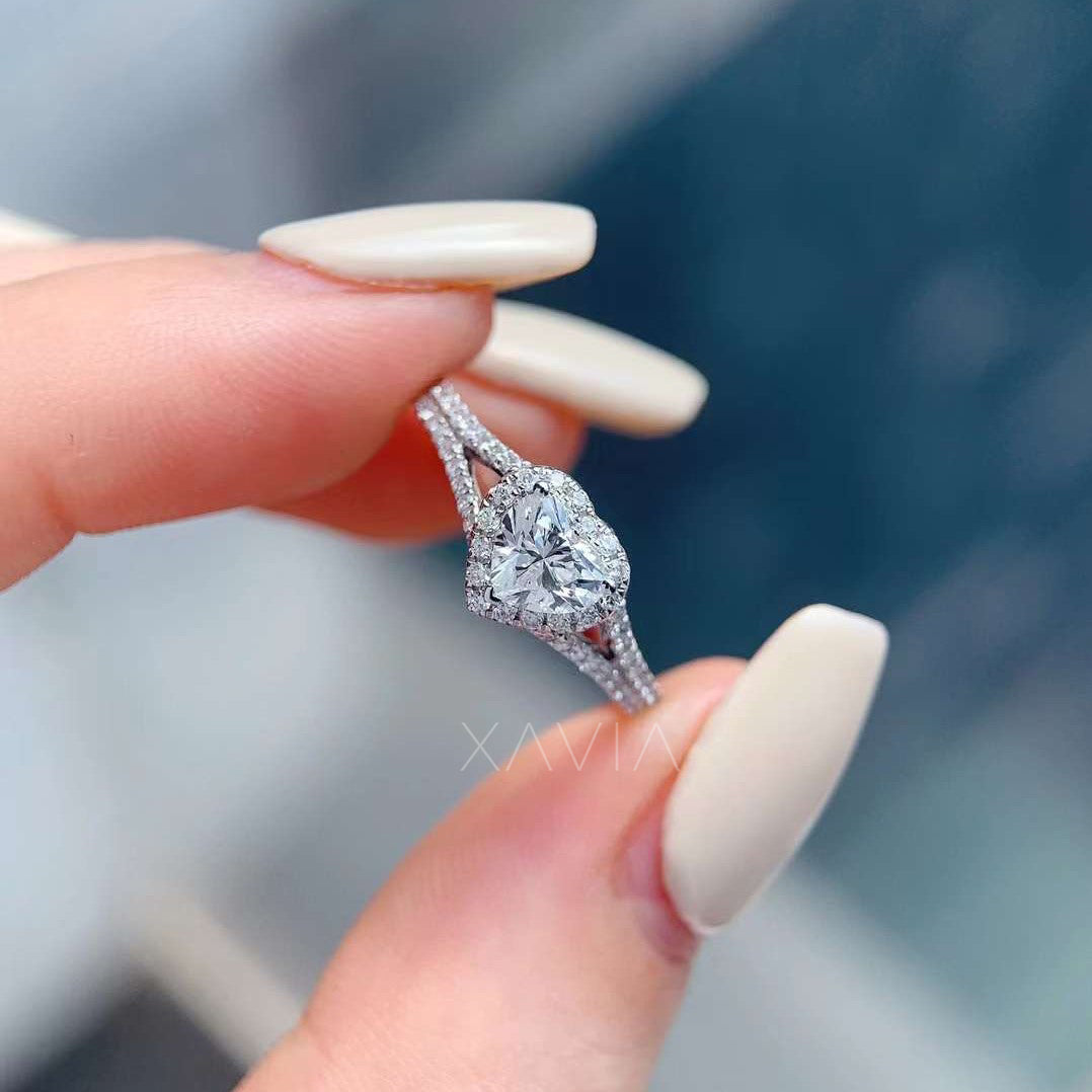 close-up of elegant heart diamond ring with pavé split shank