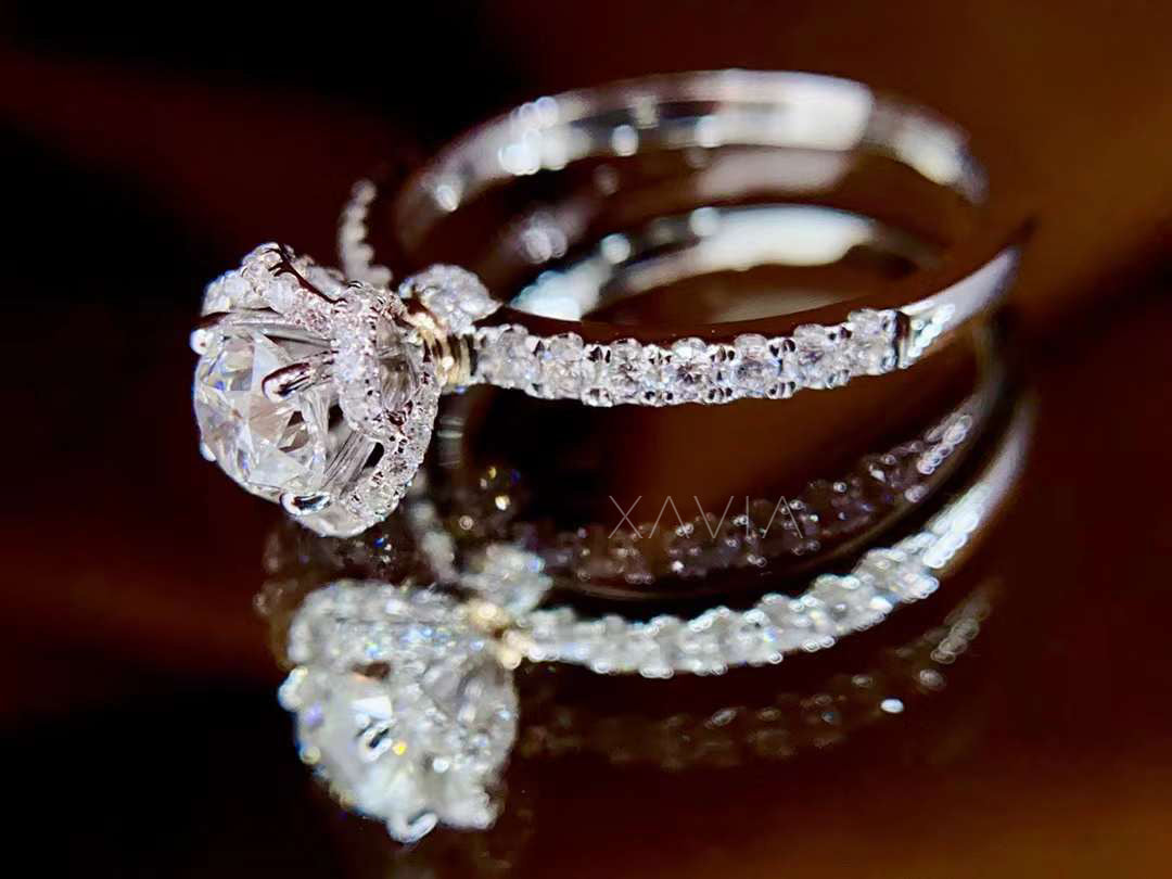 intricate floral crown halo round diamond engagement ring with pavé band and artisan craftsmanship