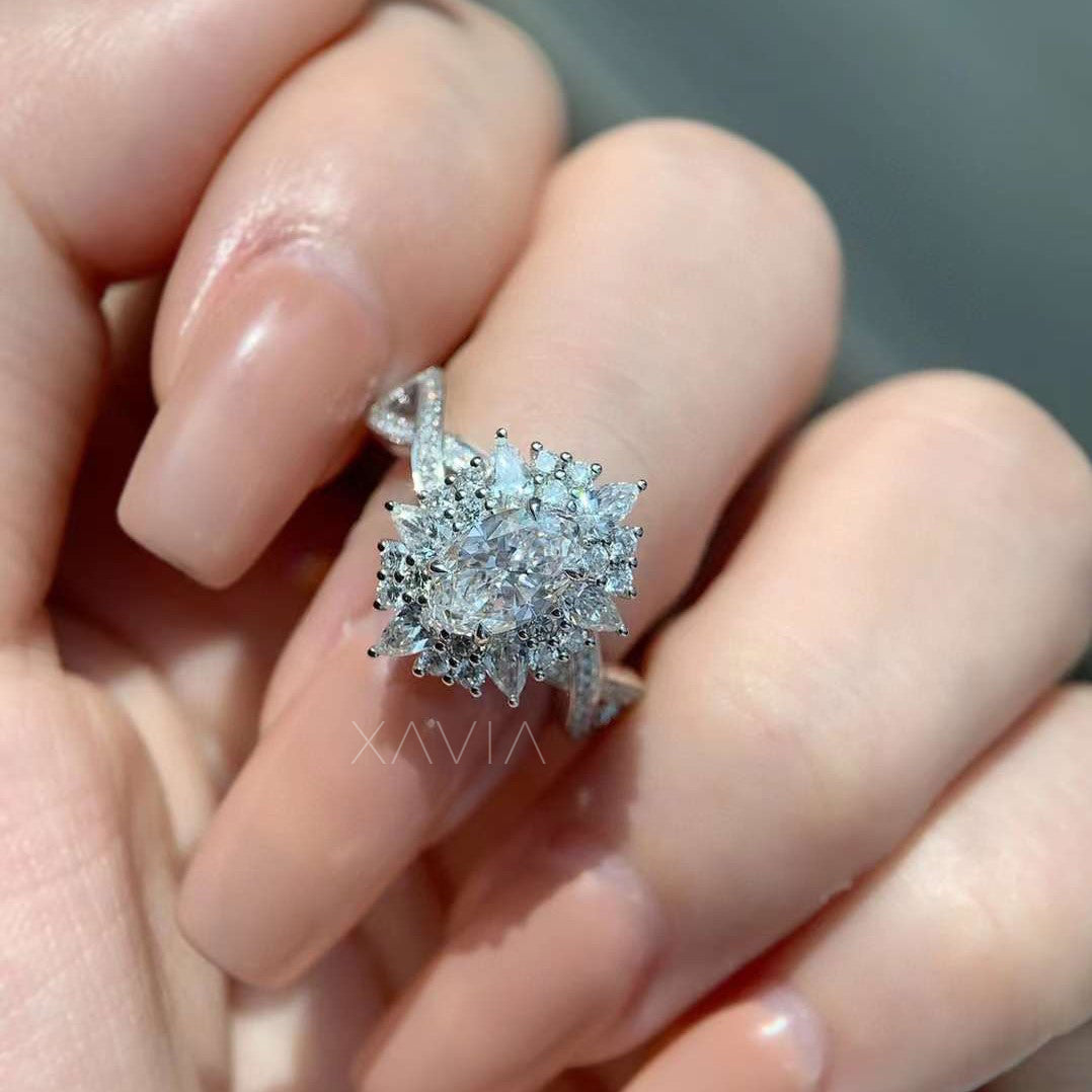 three-quarter view of floral diamond ring featuring split pavé band