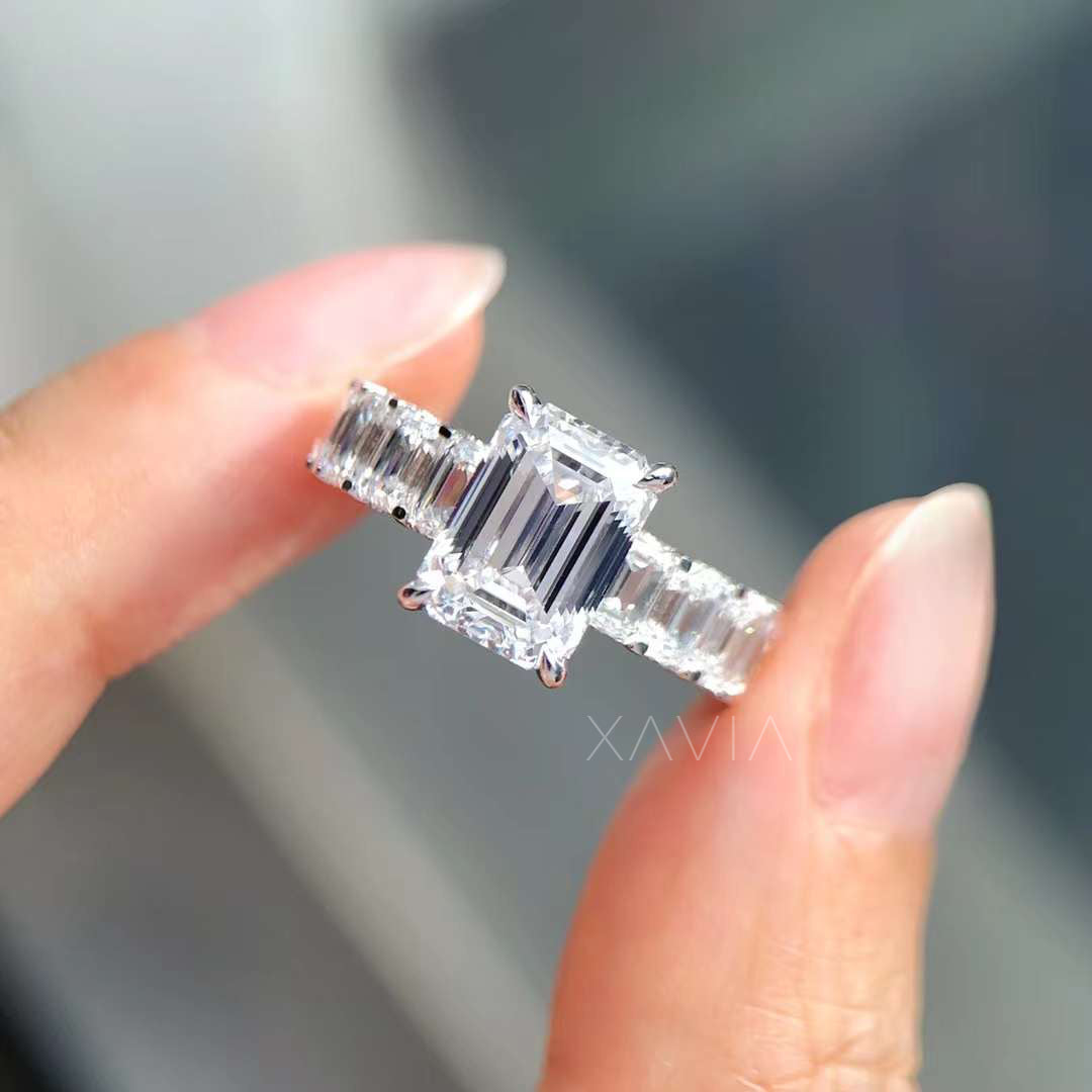 front view close-up of emerald cut lab diamond ring in daylight