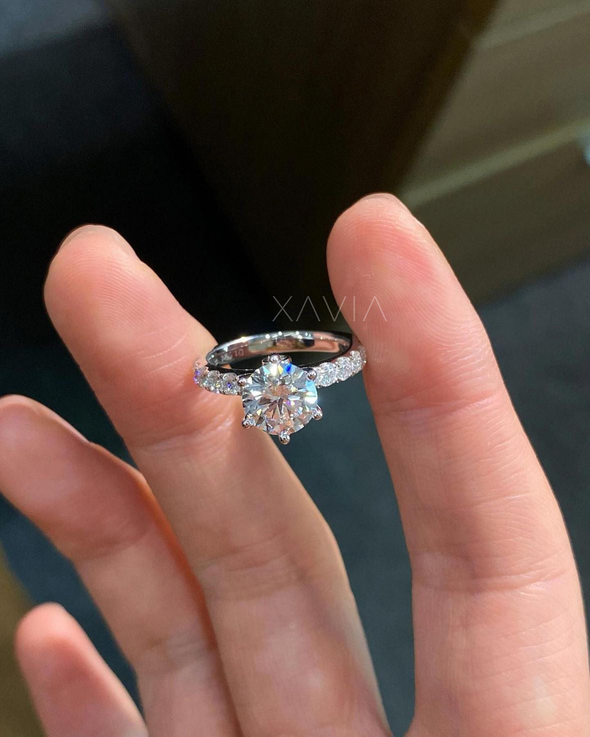 front view of round lab-grown diamond engagement ring with accent band