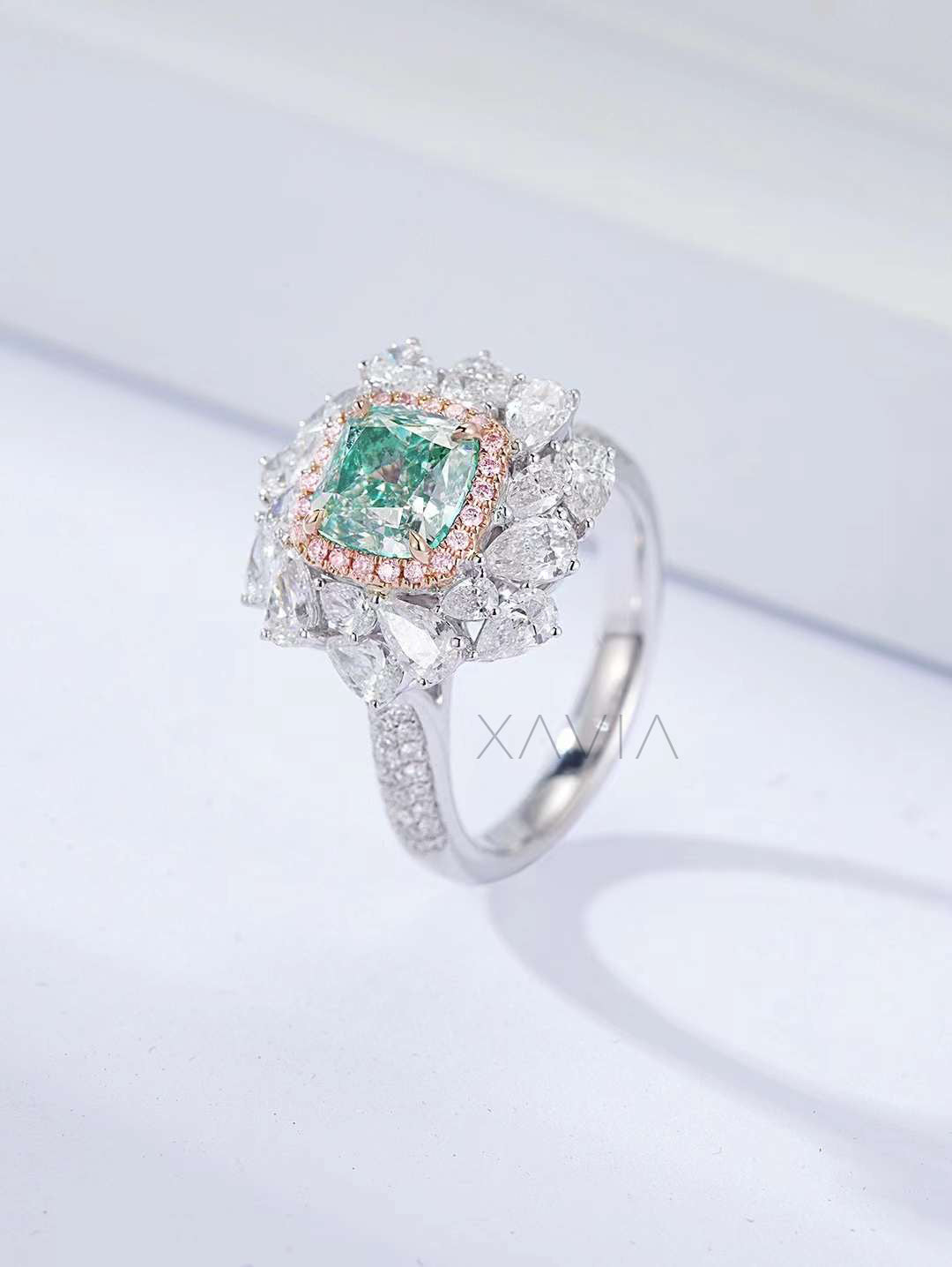 side profile of floral green diamond cocktail ring with pavé-set white diamonds and cushion center