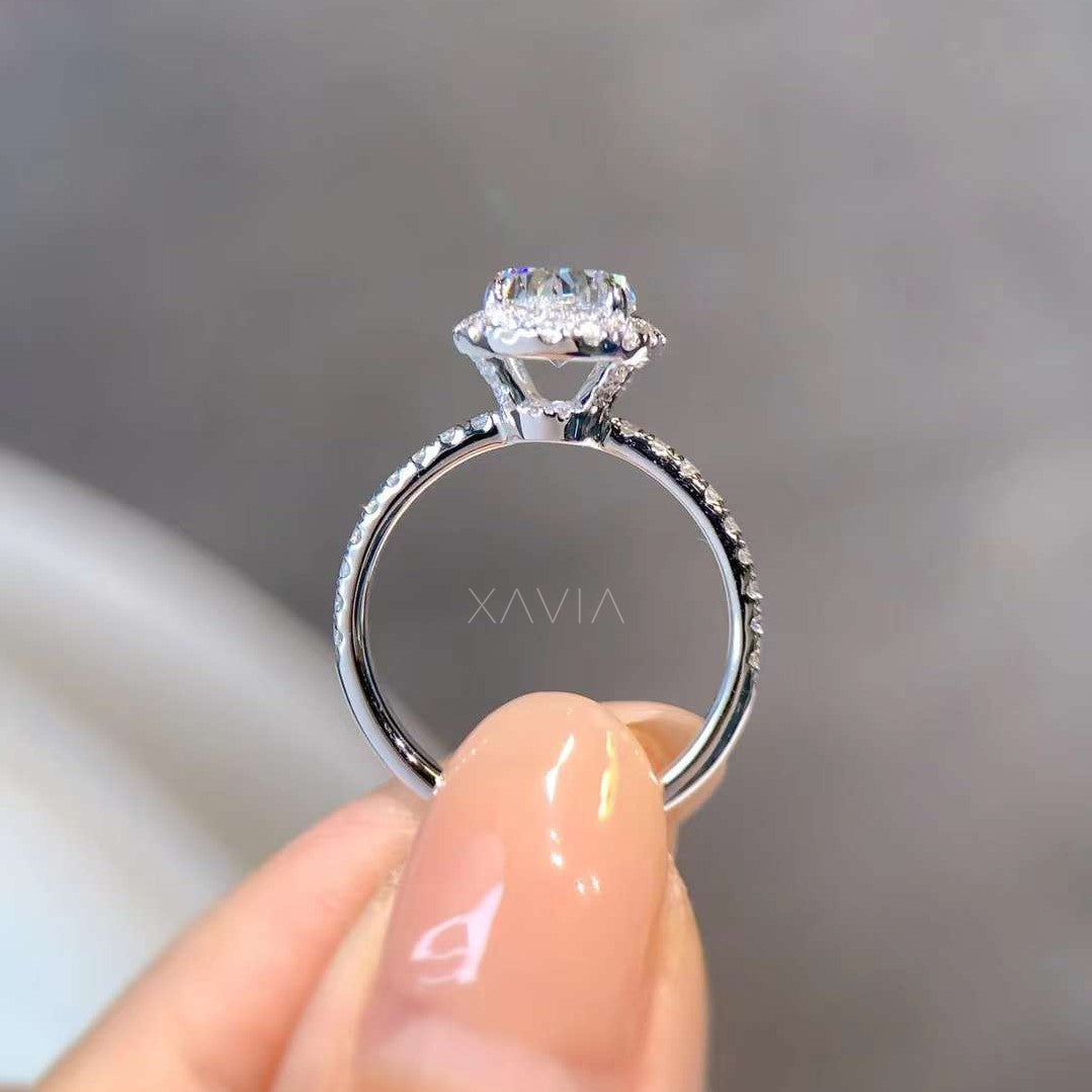 side profile of oval lab diamond ring with raised halo setting