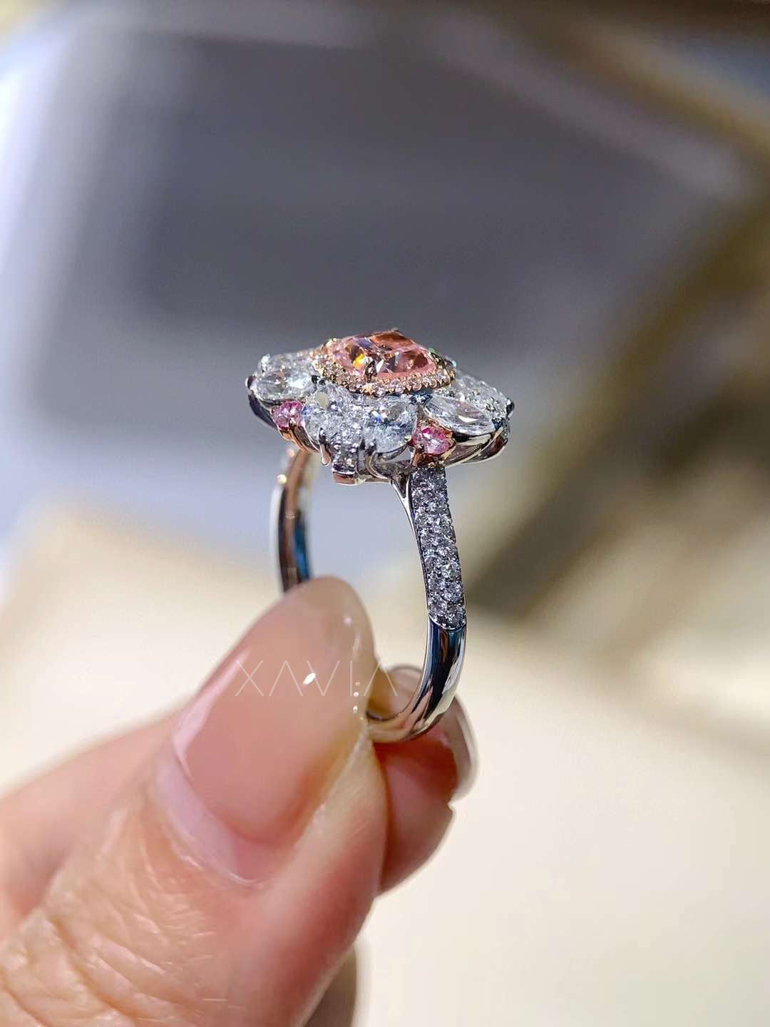 angled profile of floral pink diamond engagement ring