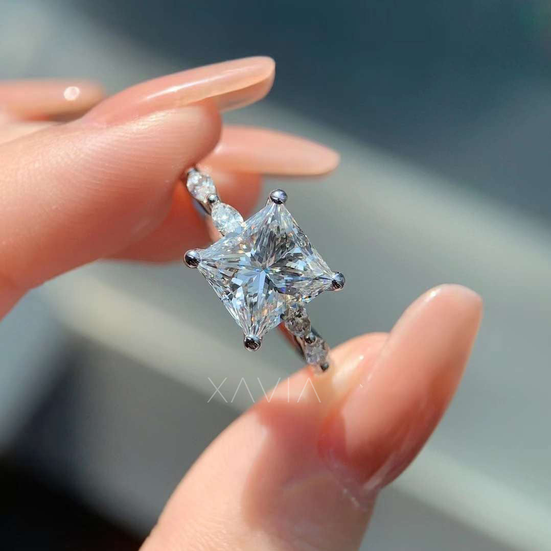 hand model holding luxury princess cut lab-grown diamond engagement ring