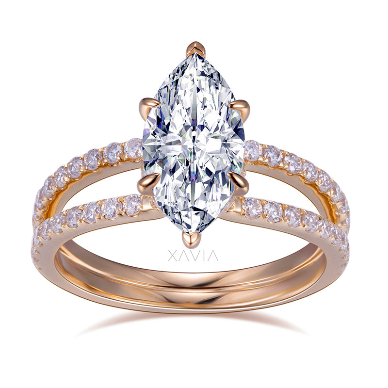 Front view of marquise cut lab grown diamond engagement ring with split shank pavé band and floating prong setting in polished gold