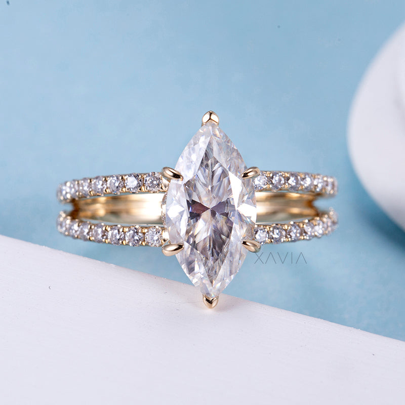 Angled perspective of marquise lab diamond engagement ring showcasing split pavé shank design and elongated center stone brilliance