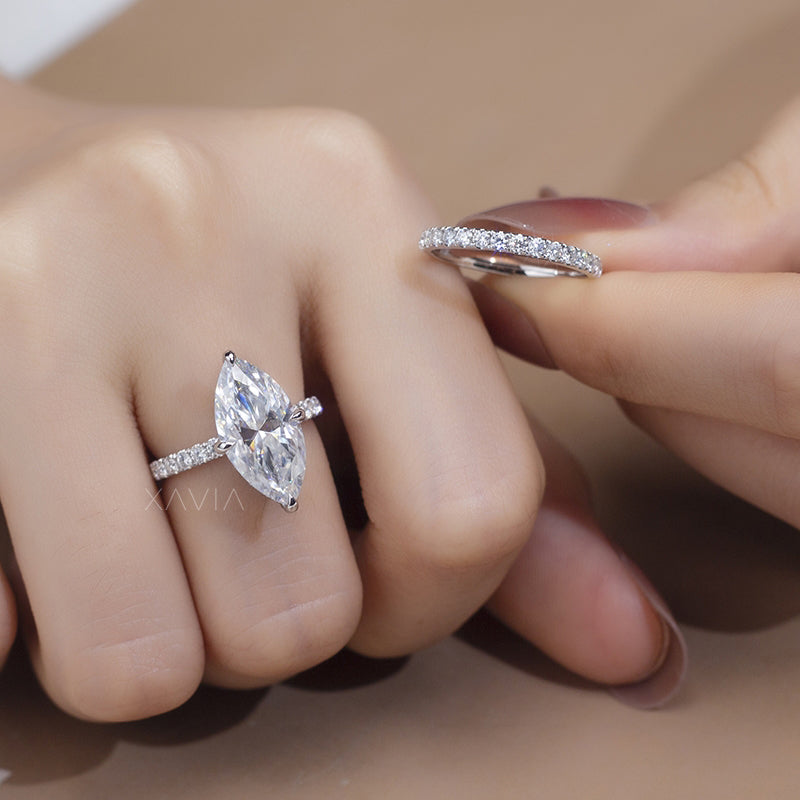 Marquise cut lab diamond engagement ring worn on hand with pavé wedding band showing elegant proportions and bright sparkle