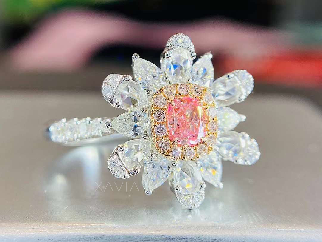 Side angled view showing raised floral marquise halo surrounding pink cushion center lab diamond engagement ring