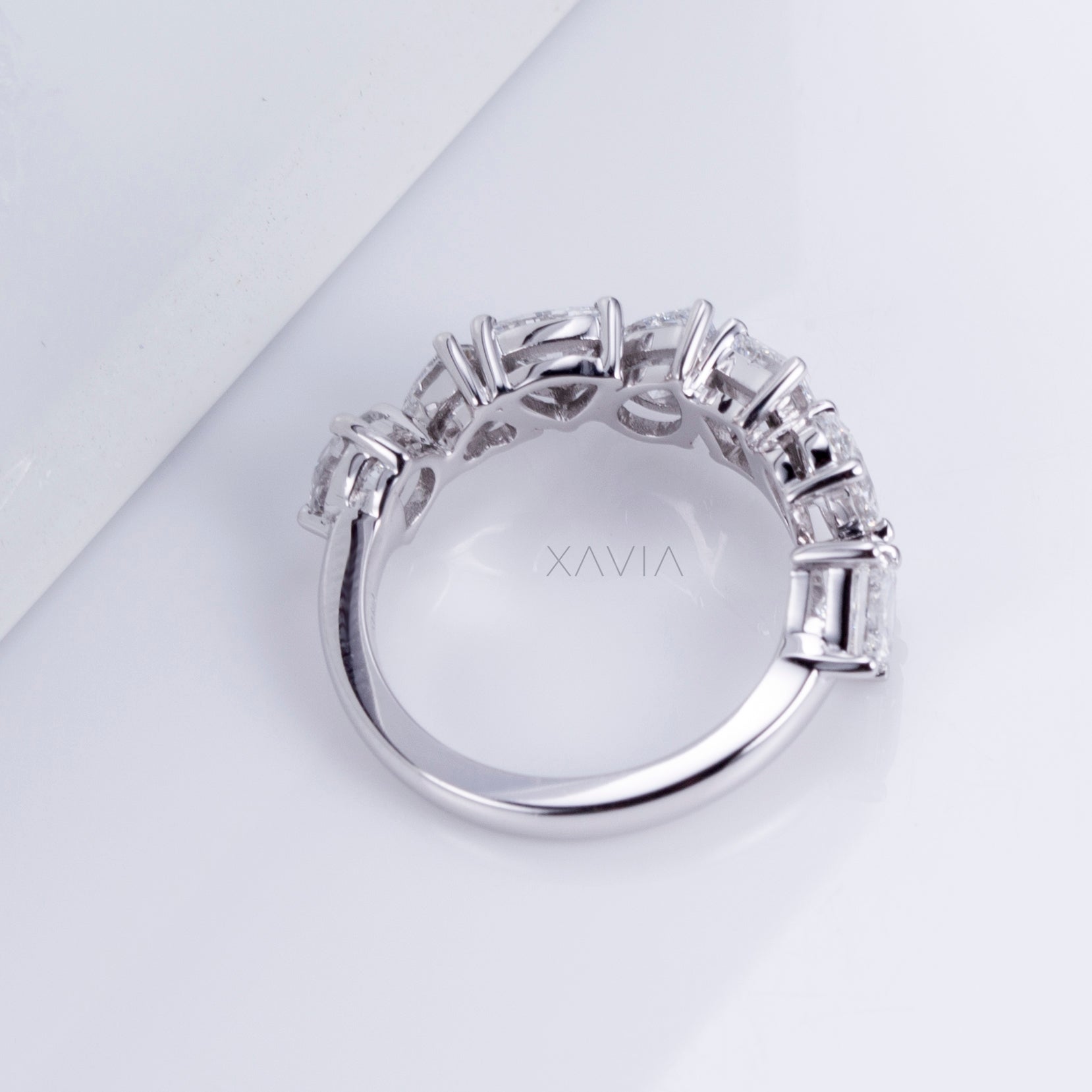 Overhead view of diamond shapes in elegant arc formation