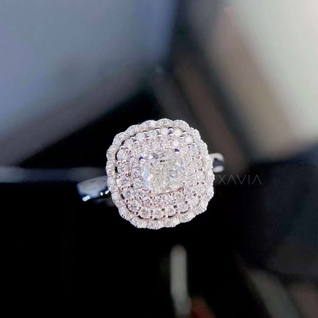 Side profile of Noctyra cushion cut lab diamond ring revealing elevated double halo setting and elegant split shank structure.