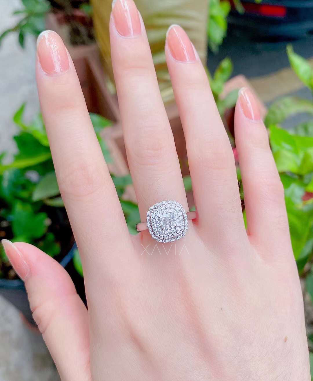 Top view of Noctyra cushion cut lab diamond ring showcasing layered double halo design with round pavé diamonds and refined symmetry.