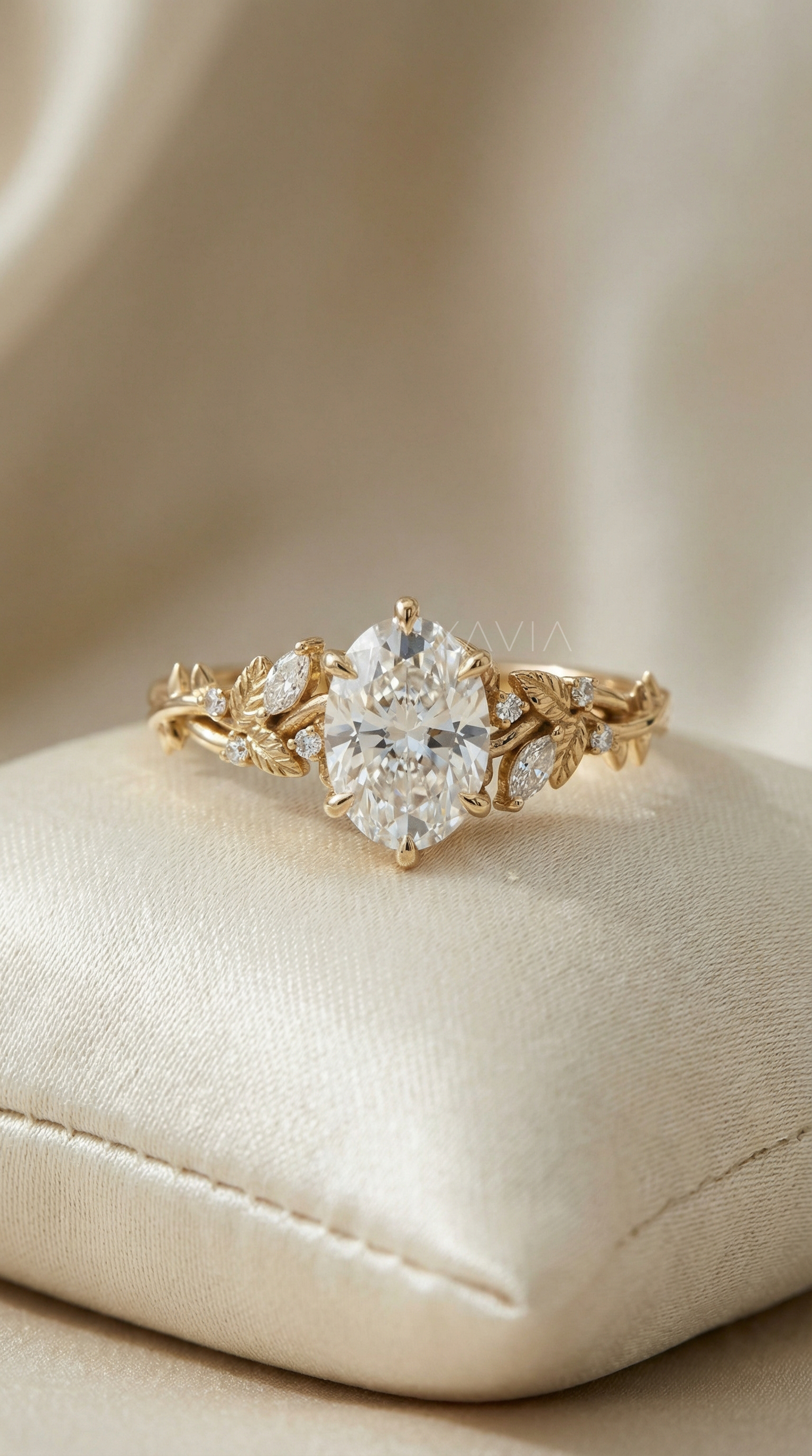 Oval cut lab-grown diamond engagement ring in a six-prong cathedral setting with graduated round diamond side cluster on a polished yellow gold band
