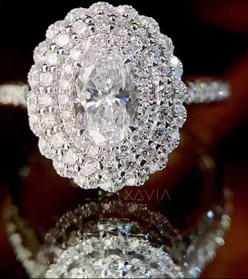 Elegant diamond ring with intricate design on a dark background
