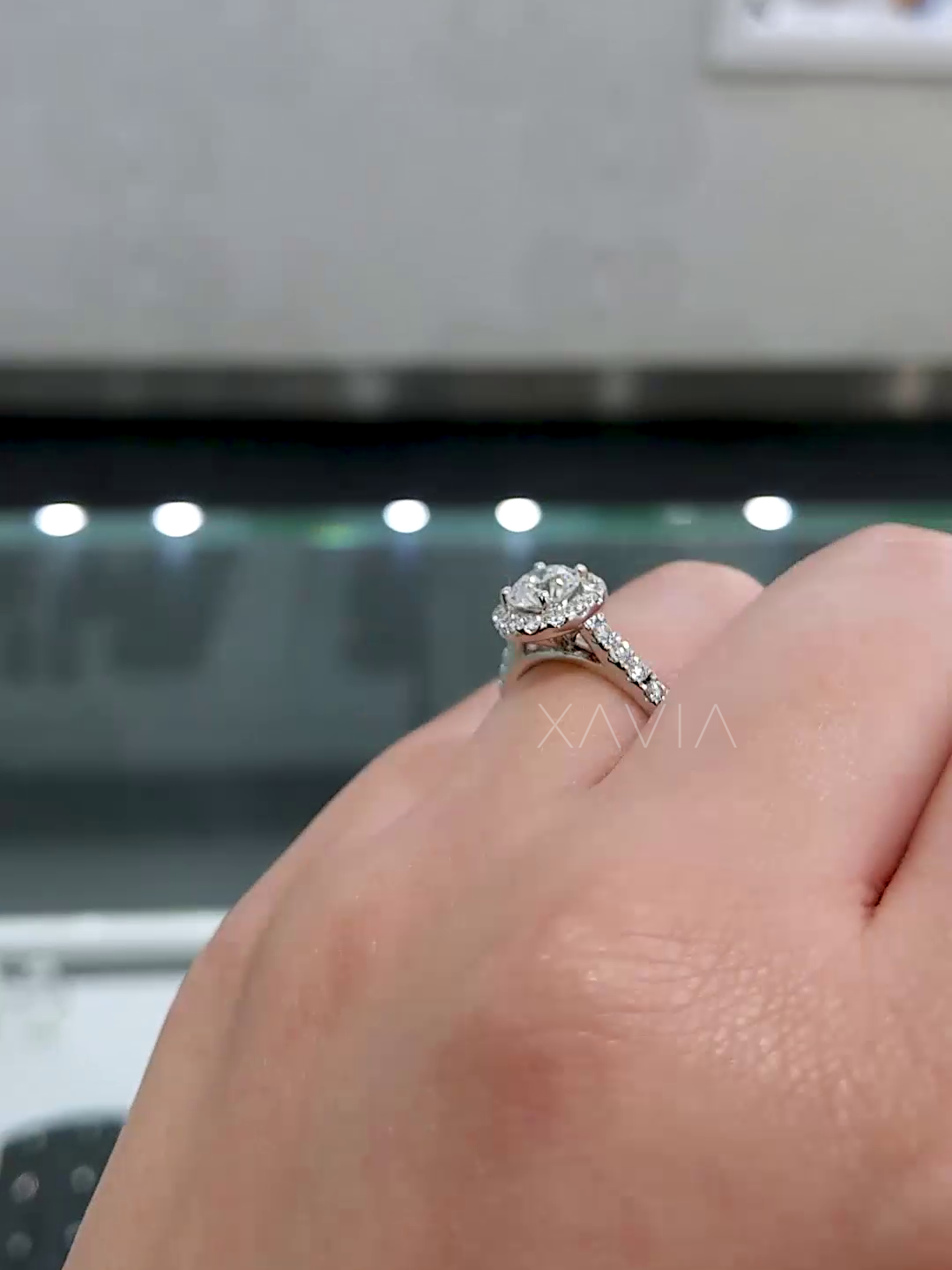 side angle of halo ring with pavé-set diamonds on shank