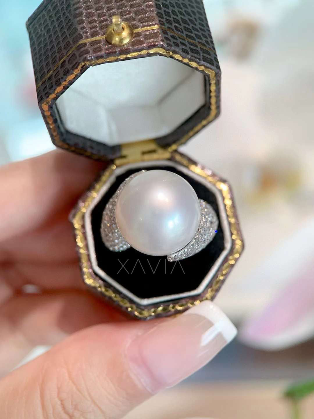 luxury pearl diamond bypass ring displayed in premium ring box highlighting pavé lab diamond shoulders and luminous round pearl centerpiece