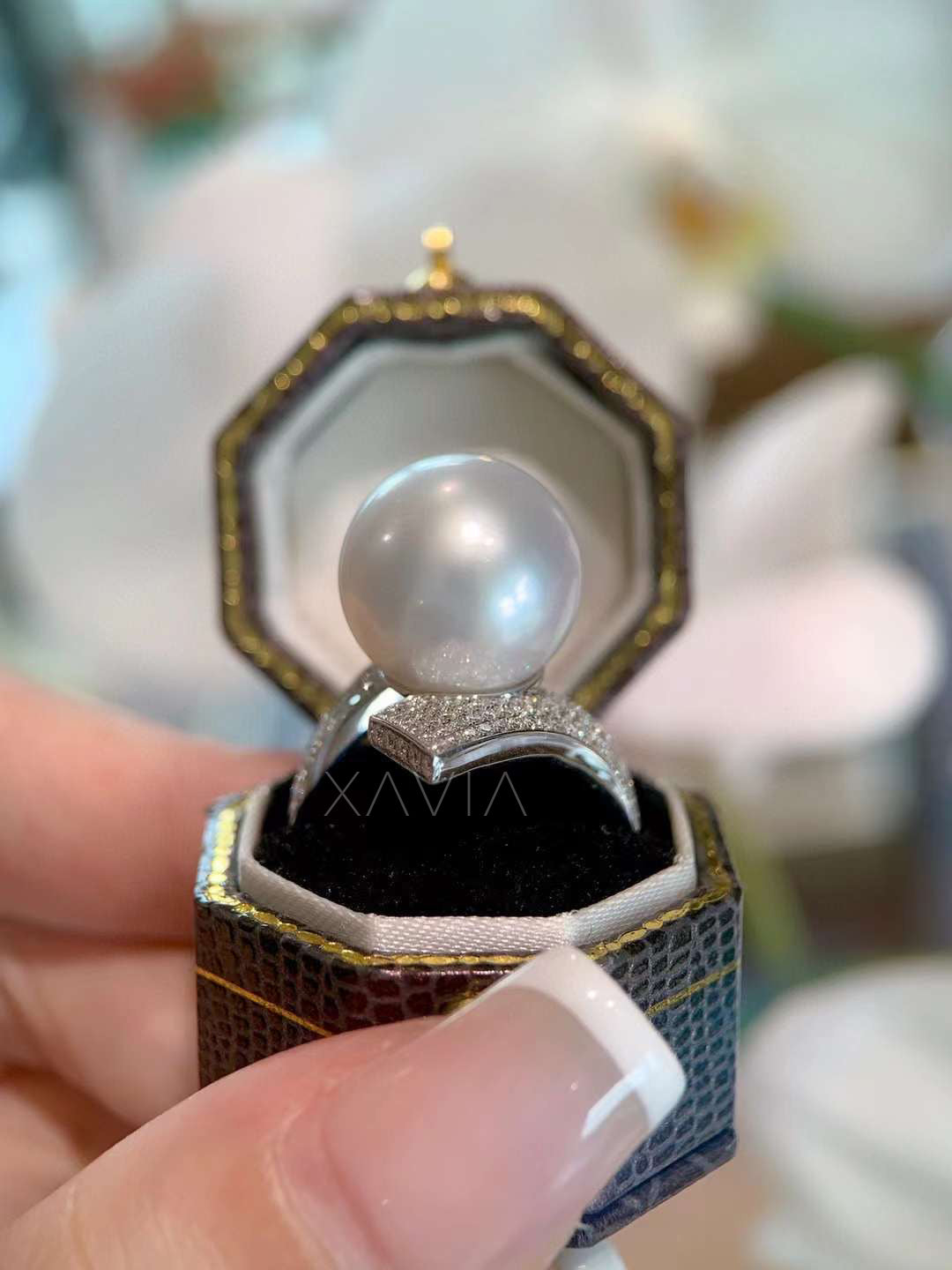 Back view of pearl and pavé diamond ring revealing comfort-fit band and precision diamond craftsmanship