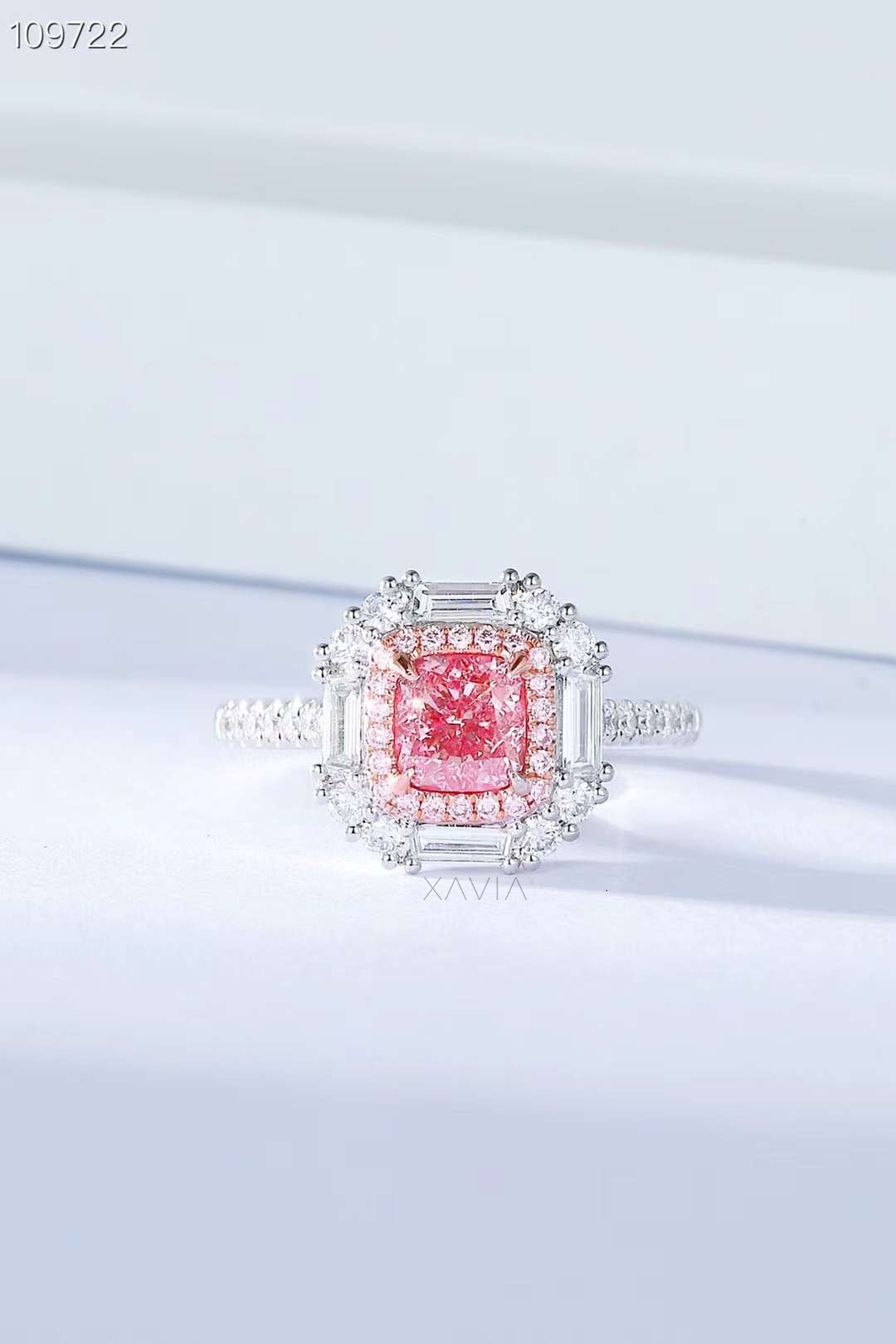 radiant pink cushion cut diamond ring with baguette and round halo design