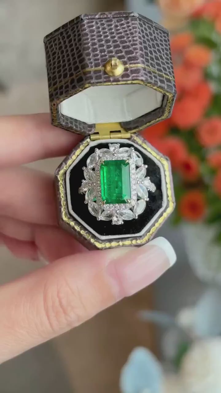 Verdant Empress Bloom – Emerald Cut Green Gemstone Cocktail Ring with Floral Marquise Diamond Halo and Pavé Frame Statement Ring