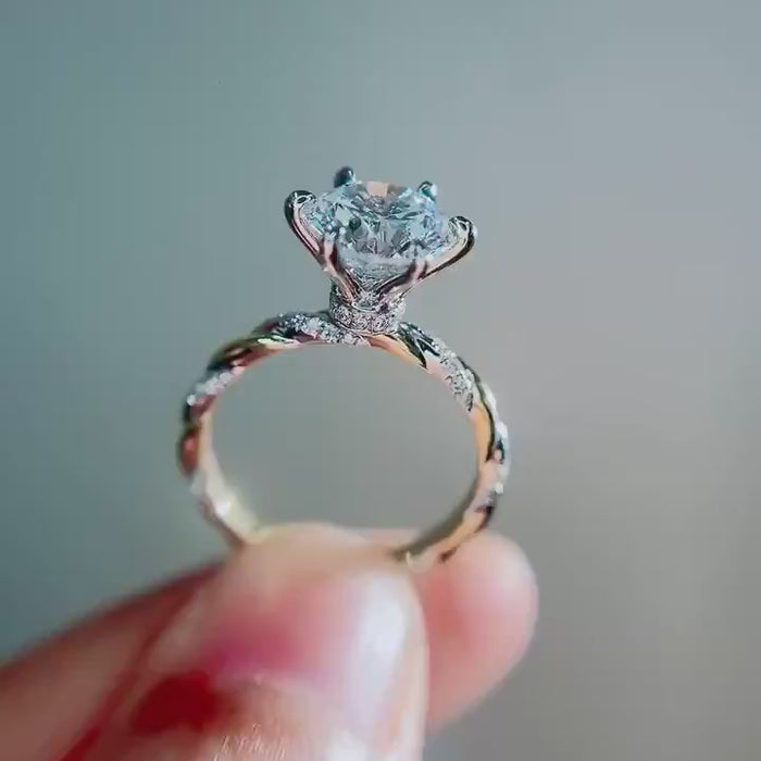 Round brilliant lab-grown diamond solitaire ring featuring DEF color VVS–VS clarity center stone, pavé twisted band, cathedral setting in solid gold or platinum.