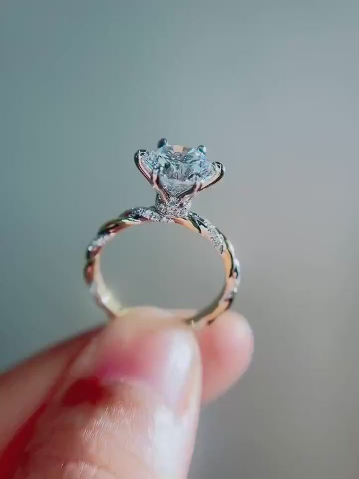 Round brilliant lab-grown diamond solitaire ring featuring DEF color VVS–VS clarity center stone, pavé twisted band, cathedral setting in solid gold or platinum.