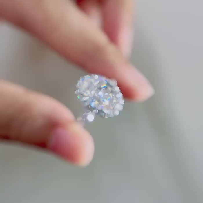 Oval cut DEF color lab-grown diamond center with pavé halo and pavé diamond band, crafted in solid gold or platinum with VVS–VS clarity brilliance.