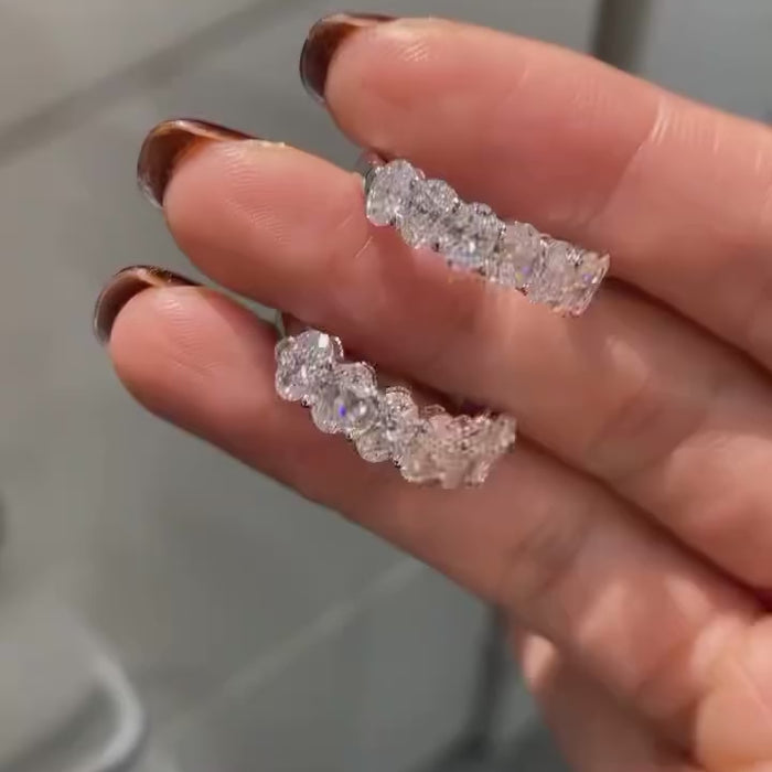 360° showcase of oval lab diamond half band in shared prong setting
