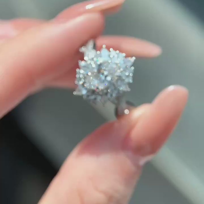 blooming floral lab diamond engagement ring worn on hand