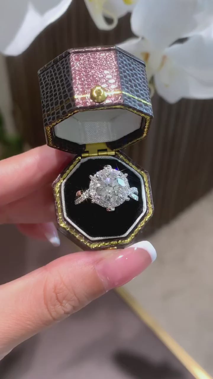 Floravine – Round Cut Halo Engagement Ring with Twisted Pavé Band and Nature-Inspired Diamond Petal Setting