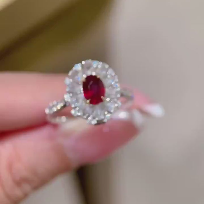 Crimson Aurelia Halo – Oval Red Gemstone Center Ring with Radiant Marquise Diamond Floral Halo and Pavé Diamond Shank