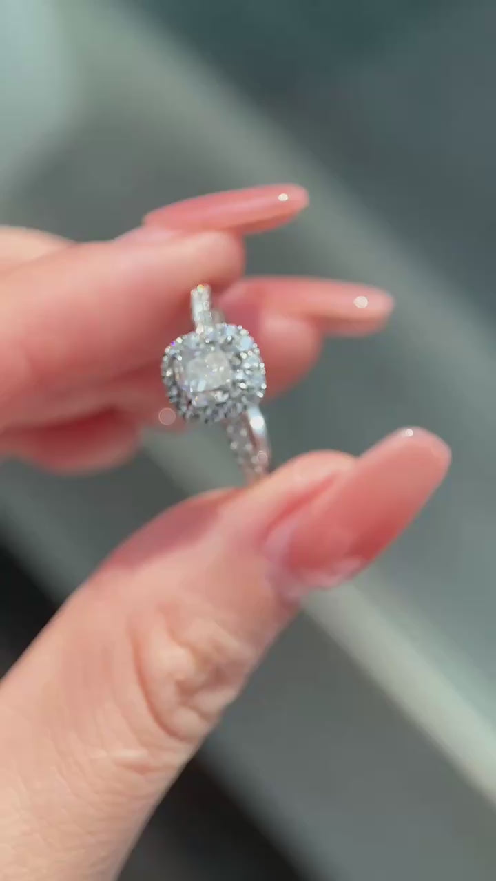 sunlit view of cushion cut halo lab diamond ring with pavé shank