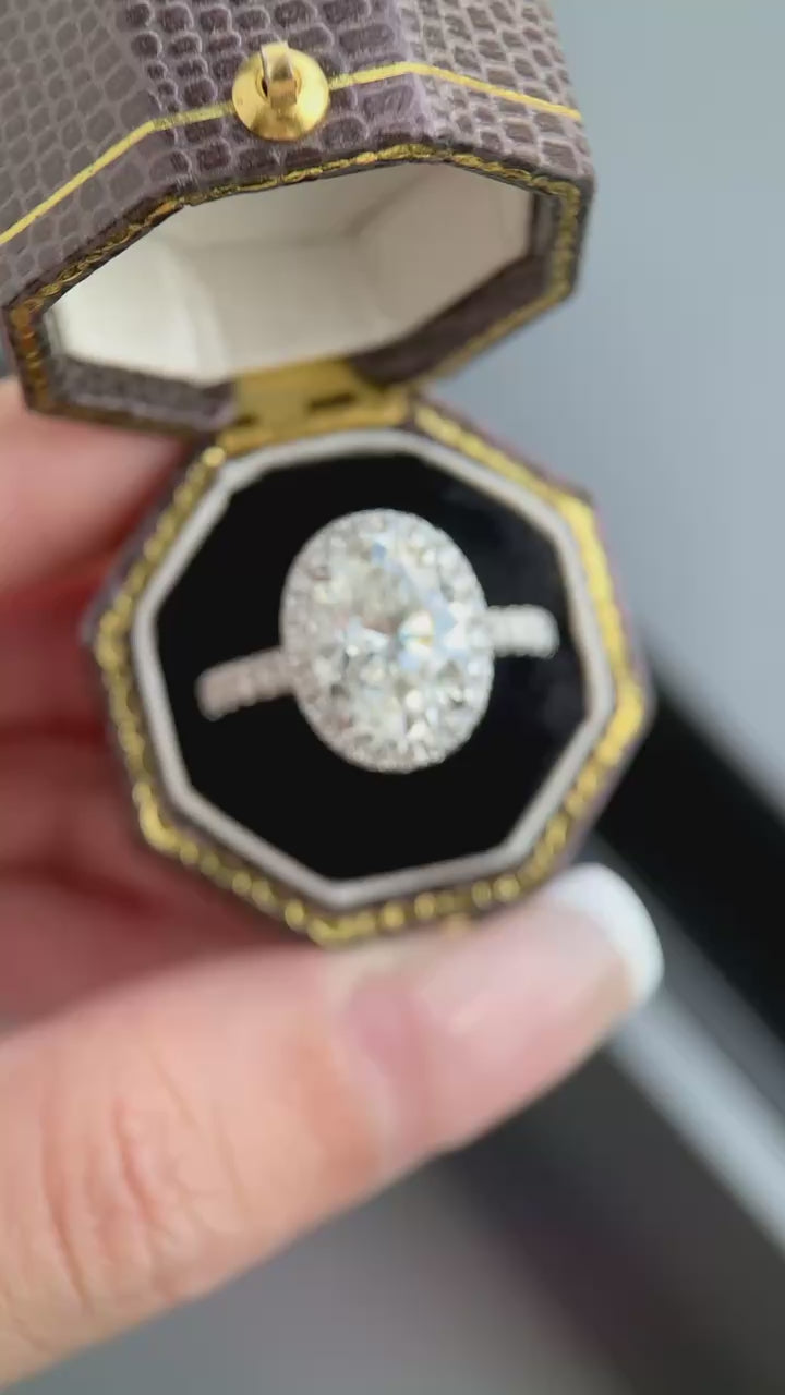 DEF color, VVS/VS+ clarity lab-grown oval diamond center with pavé halo, customizable carat sizes, in 18KT gold or platinum