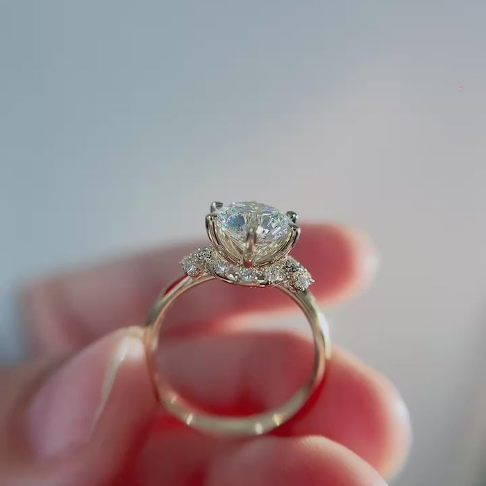 Aurielle Crescent Halo – round Lab-Grown Diamond Engagement Ring with Sculpted Half Halo, Floral Side Accents and Elevated Cathedral Solitaire Setting