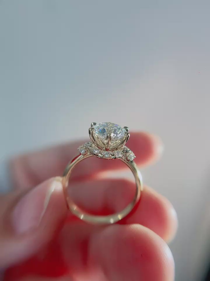 Aurielle Crescent Halo – round Lab-Grown Diamond Engagement Ring with Sculpted Half Halo, Floral Side Accents and Elevated Cathedral Solitaire Setting