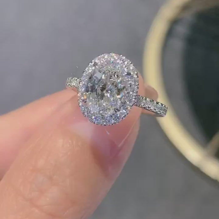 Celistra – Oval Lab Diamond Engagement Ring with Halo Setting & Pavé Band