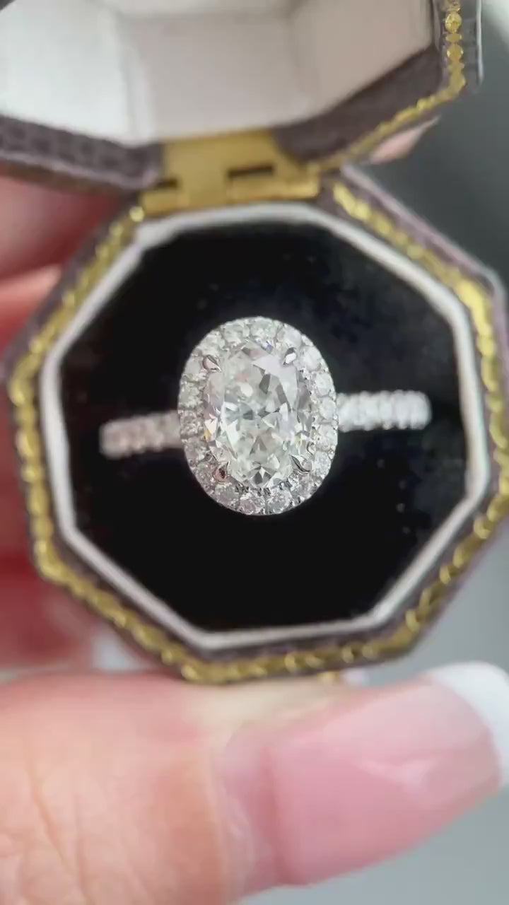 Oval lab-grown diamond halo engagement ring featuring DEF color VVS–VS clarity diamonds, triple pavé diamond vine band design in solid gold or platinum.