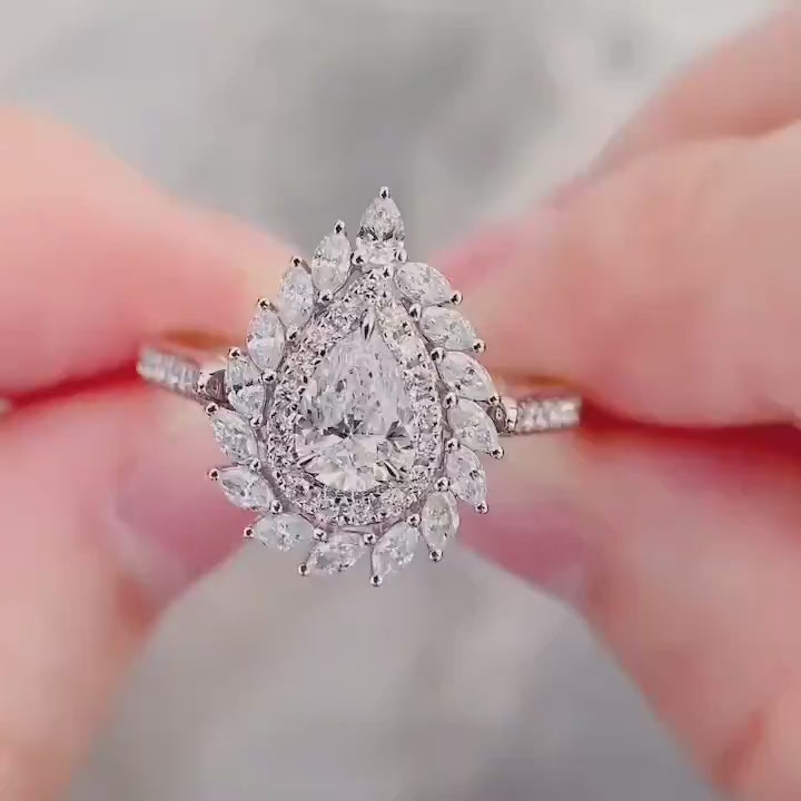 Petalyn Crown Pear Cut Diamond Halo Engagement Ring with Floral Marquise Design