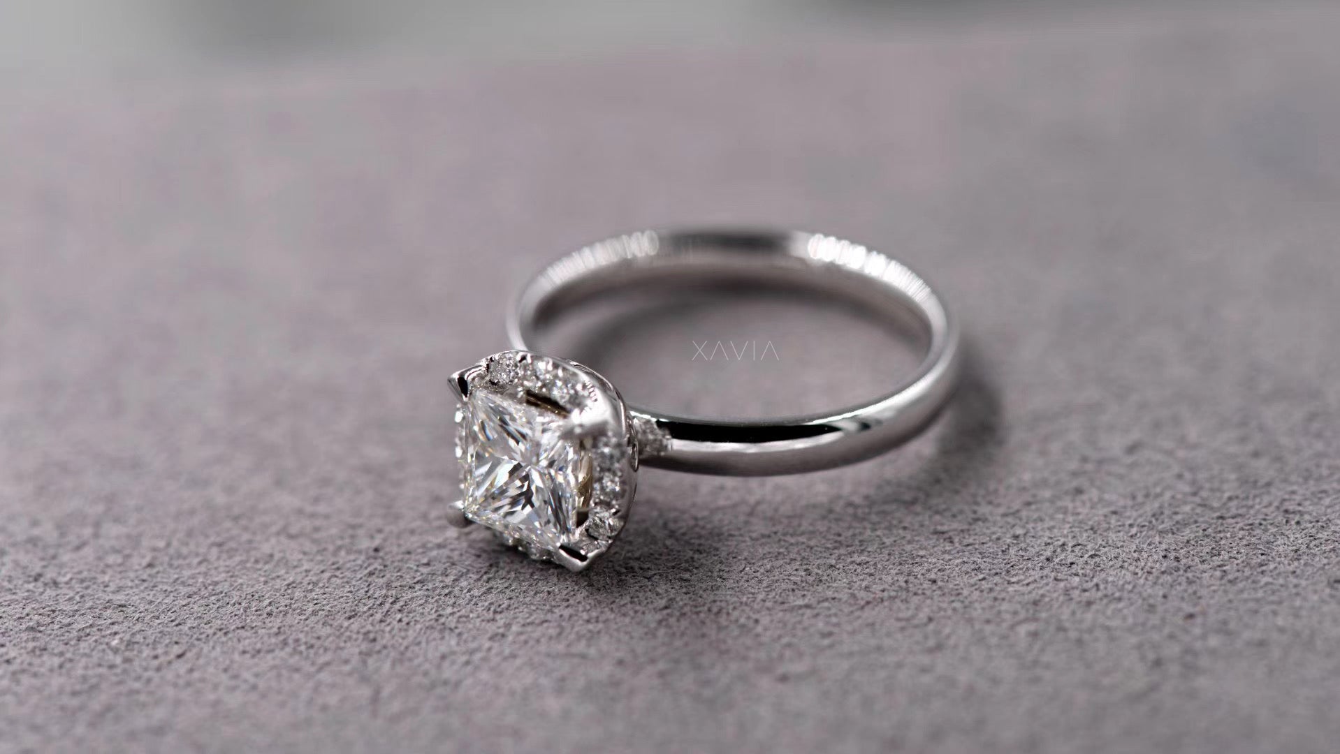 top view of princess cut lab grown diamond engagement ring featuring crescent pavé halo accent diamonds framing the center stone