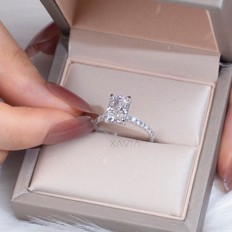 Radiant cut lab grown diamond solitaire ring with pavé band displayed in luxury jewelry box highlighting refined craftsmanship